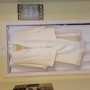 Very dressy 2pc matching Ivory jacket and skirt